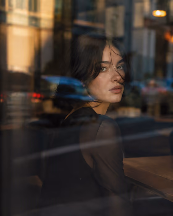 Reflective Urban Cafe Portrait