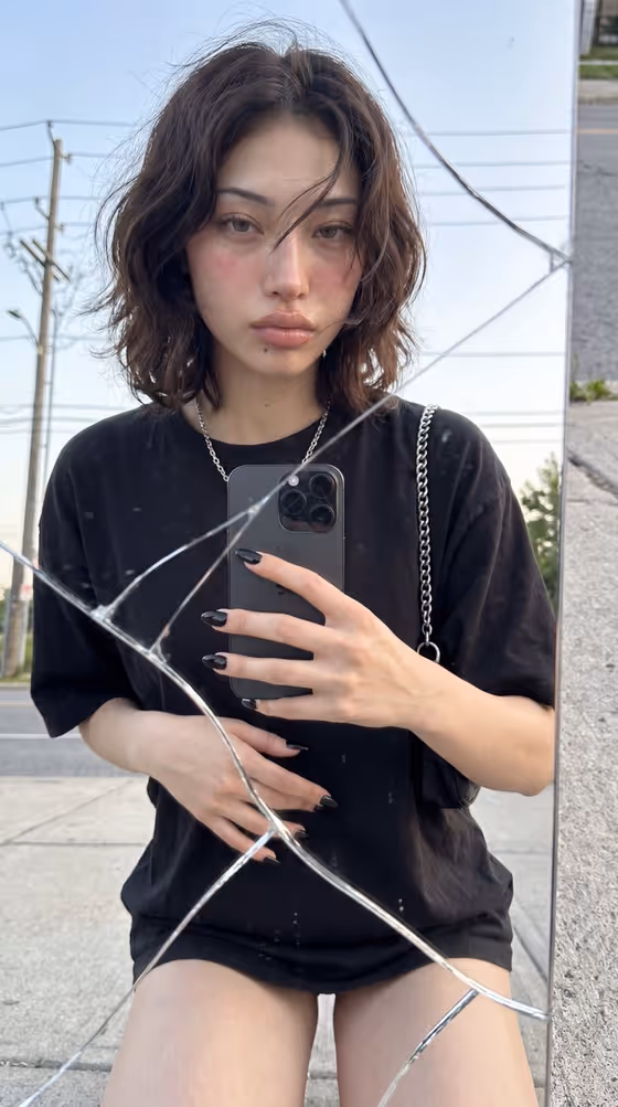 Cracked Mirror Selfie